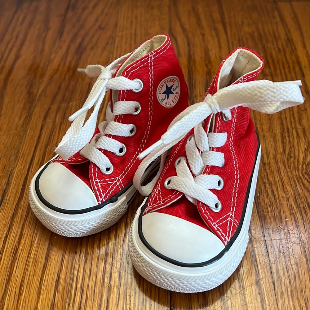 Baby high top converse, hard sole.